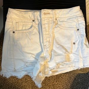 White jean shorts that are high waisted